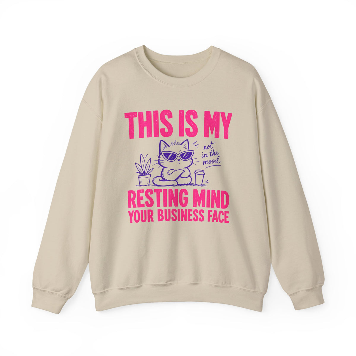 Sand Gildan 18000 sweatshirt with Resting Mind Your Business Face cat design printed on front.