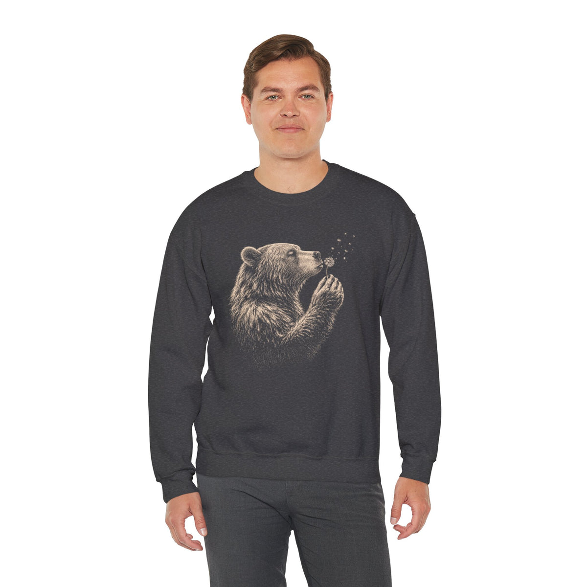 Navy sweatshirt with bear blowing dandelion seeds woodland graphic.