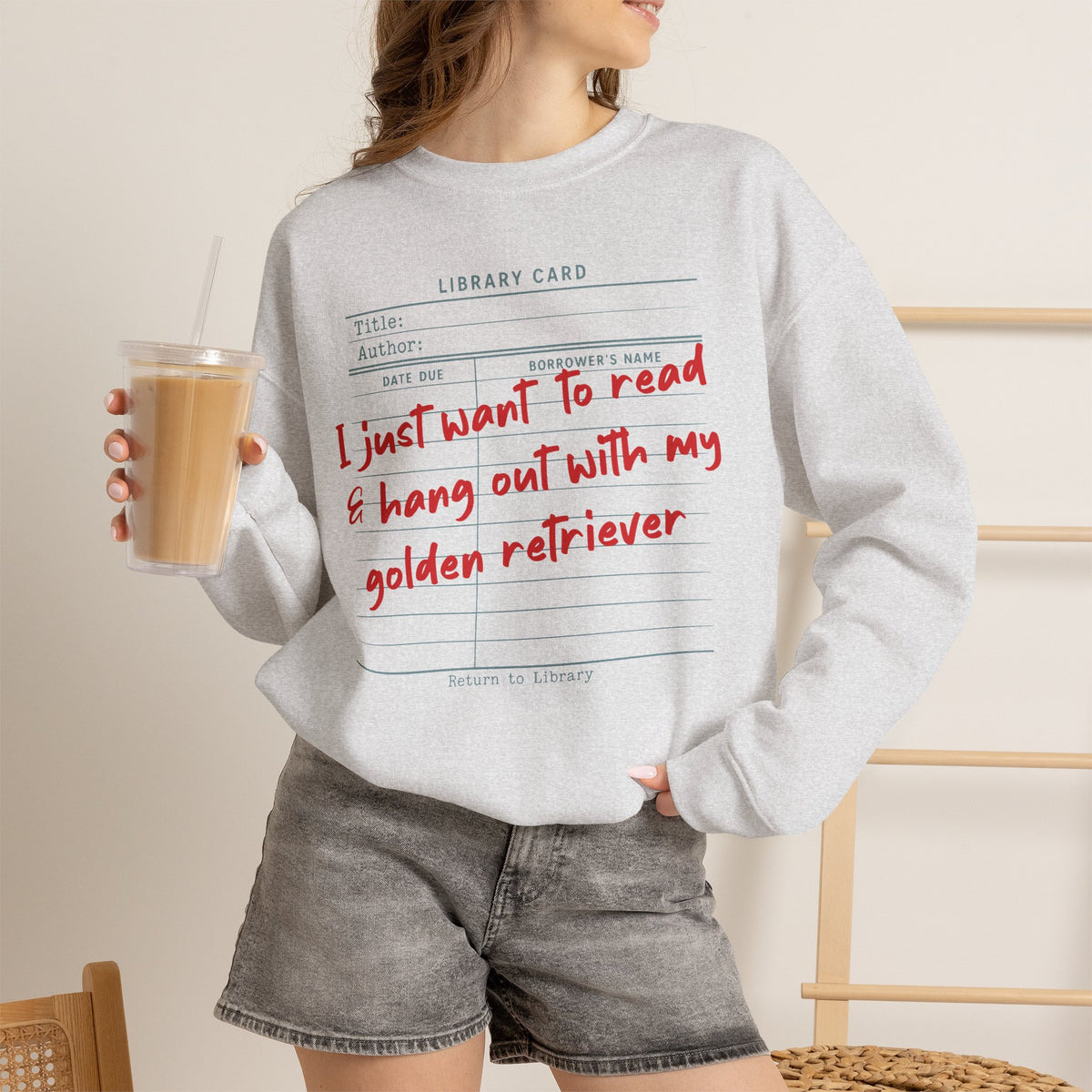 Ash crewneck sweatshirt with Golden Retriever and reading library card statement.