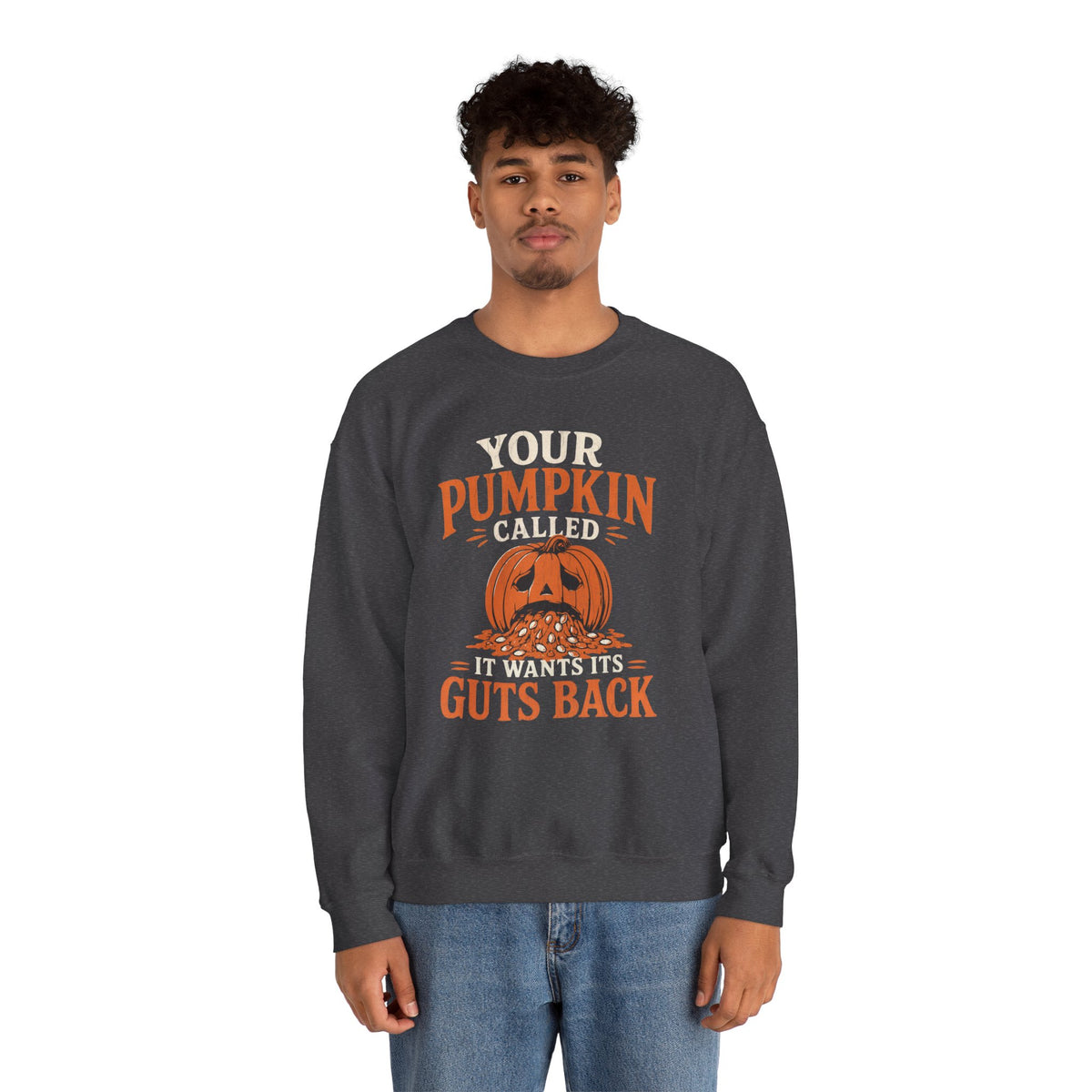 Lifestyle mockup of the Your Pumpkin Called It Wants Its Guts Back Gildan 18000 sweatshirt.