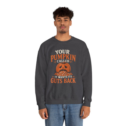 Lifestyle mockup of the Your Pumpkin Called It Wants Its Guts Back Gildan 18000 sweatshirt.