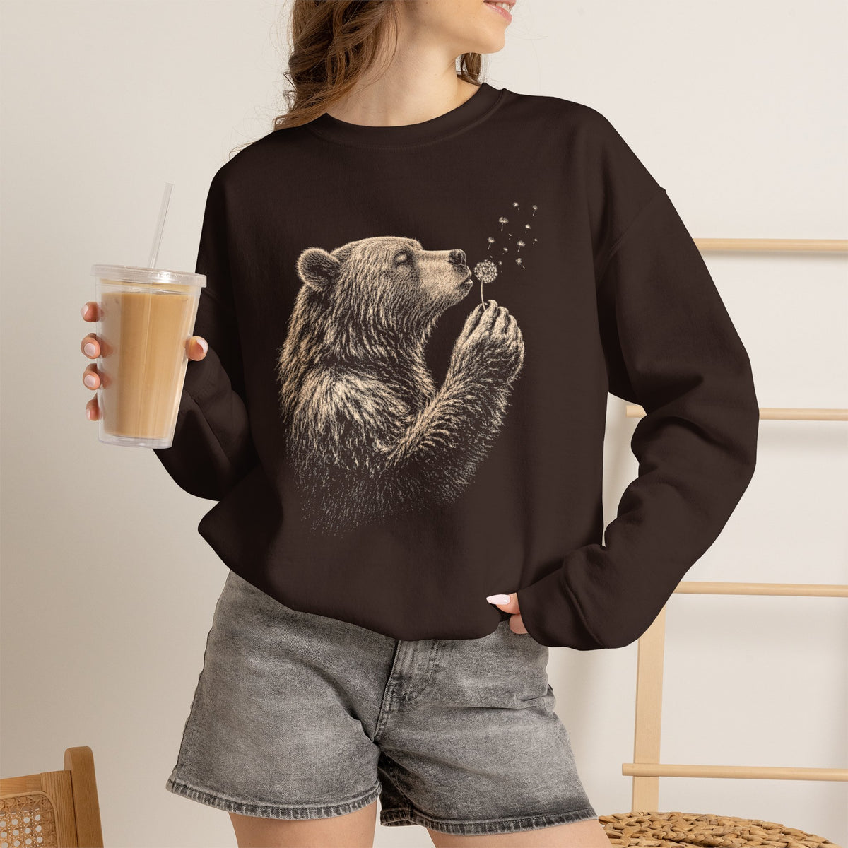 Dark Chocolate sweatshirt with bear blowing dandelion seeds woodland design.