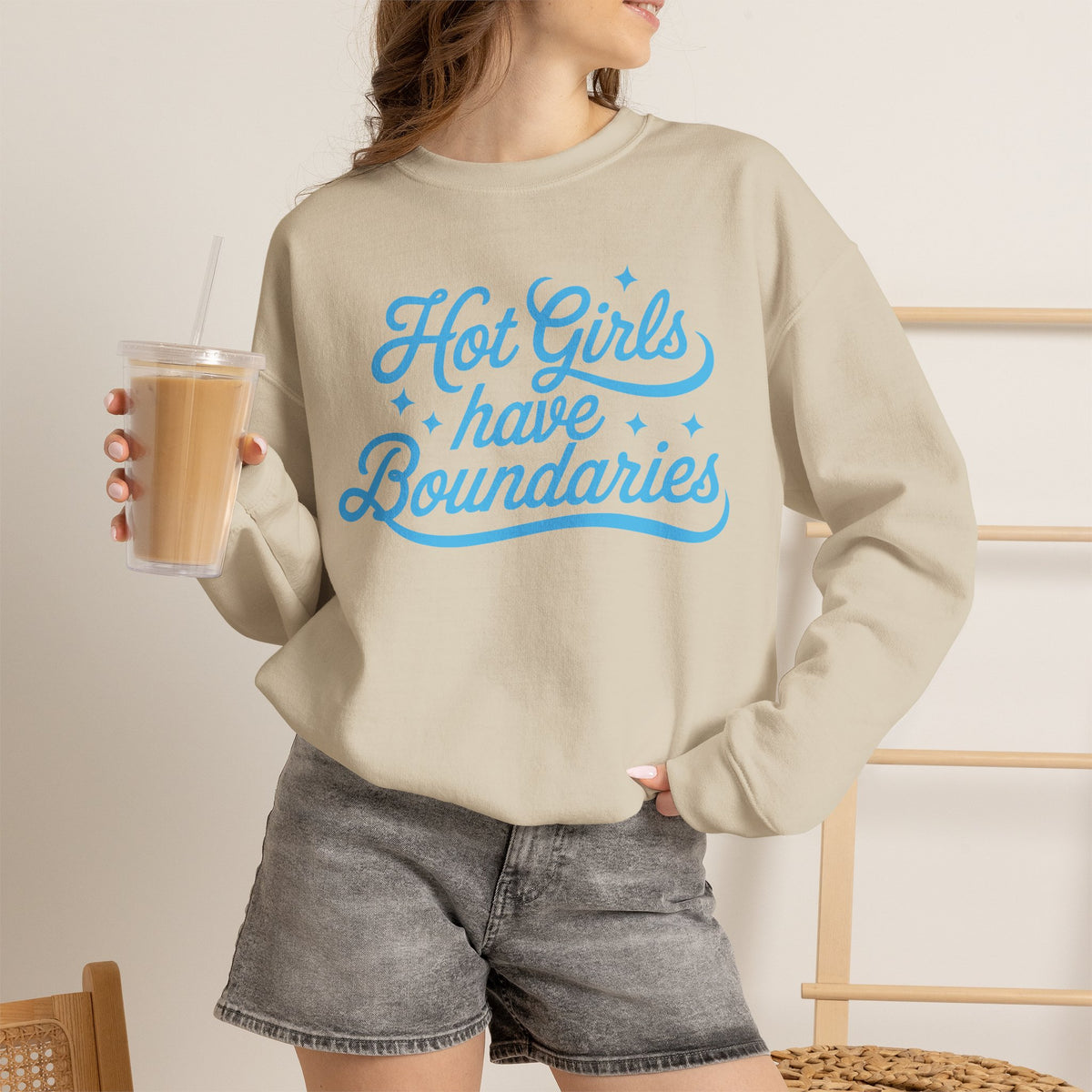 Sand Gildan 18000 sweatshirt with Hot Girls Have Boundaries blue script design printed on the front.